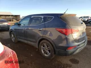 ✅ 2018 Hyundai Santa Fe 2.4L • VIN: 5XYZTDLB8JG523085 • Лот: 67651652. Опубликован ранее на Copart с пробегом 91 830 миль. Бесплатный доступ к архиву аукционных продаж из США и подробный отчёт об истории автомобиля на DreamBid. Изображение 2.