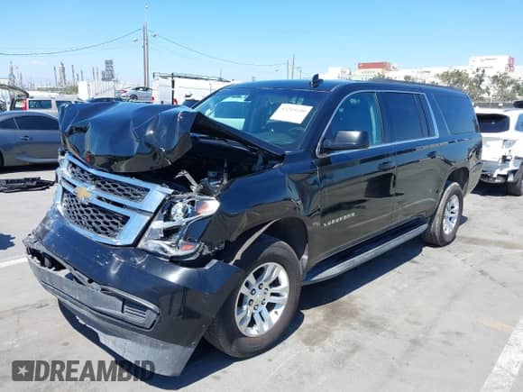 2018 Chevrolet Suburban LS z VIN 1GNSKGKC6JR150248, wystawiony jako IAAI lot #42219120 z przebiegiem 48 321 mil mil oraz . Historia ofert i sprzedaży dostępna na DreamBid. Obrazek 18.