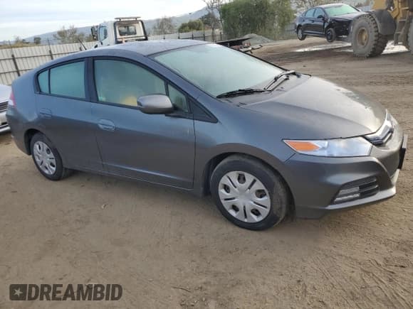 ✅ 2012 Honda Insight • VIN: JHMZE2H32CS000284 • Lot: 50160335. Listed on Copart with 64,074 mi. Free auction sales archive from the USA and detailed vehicle history report at DreamBid. Image 4.