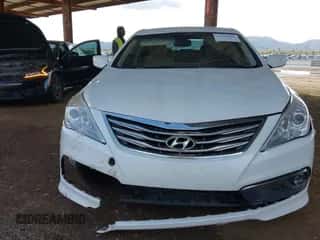 2016 Hyundai Azera z VIN KMHFG4JG6GA518624, wystawiony jako IAAI lot #41808086 z przebiegiem 103 177 mil mil oraz . Historia ofert i sprzedaży dostępna na DreamBid. Obrazek 6.