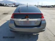 ✅ 2013 Honda Insight EX • VIN: JHMZE2H79DS004627 • Lot: 71517425. Listed on Copart with 141,986 mi. Free auction sales archive from the USA and detailed vehicle history report at DreamBid. Image 6.