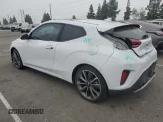 2020 Hyundai Veloster 2.0 с VIN KMHTG6AF6LU027629, выставлен на аукционе Copart как лот 76408204 с пробегом 74 849 миль миль и Списание • Salvage title. История ставок и продаж доступна на DreamBid. Изображение 2.