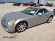 ✅ 2005 Cadillac XLR • VIN: 1G6YV34A855600349 • Lot: 42764333. Listed on IAAI with 91,067 mi. Free auction sales archive from the USA and detailed vehicle history report at DreamBid. Image 2.