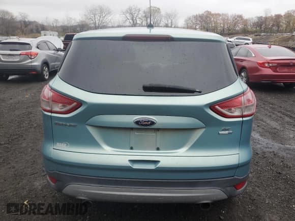 ✅ 2013 Ford Escape SE • VIN: 1FMCU9GX4DUD06461 • Lot: 91730445. Listed on Copart with 76,613 mi. Free auction sales archive from the USA and detailed vehicle history report at DreamBid. Image 6.