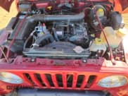 ✅ 1998 Jeep Wrangler Sport • VIN: 1J4FY19S1WP745346 • Lot: 86523665. Wystawiony na Copart z przebiegiem 126 171 mil. Bezpłatny archiwum sprzedaży aukcyjnych z USA i szczegółowy raport historii pojazdu na DreamBid. Zdjęcie 11.