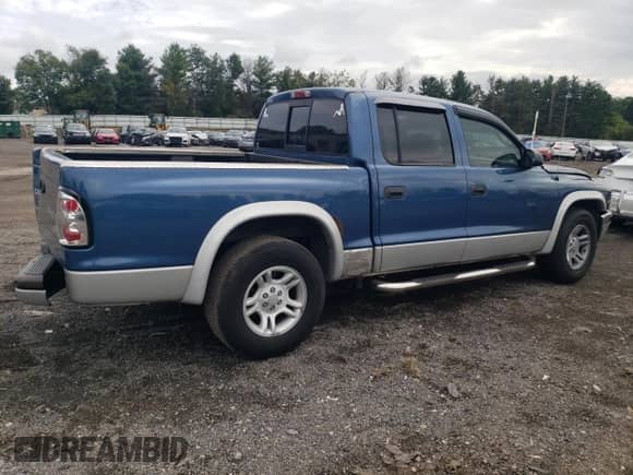 2003 Dodge Dakota SLT с VIN 1D7HL48X93S367092, выставлен на аукционе Copart как лот 71961274 с пробегом 160 709 миль миль и Списание • Salvage title. История ставок и продаж доступна на DreamBid. Изображение 3.