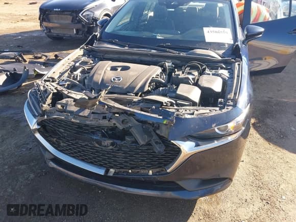 ✅ 2021 Mazda 3 Select • VIN: JM1BPABL3M1338574 • Lot: 43586559. Listed on IAAI with 89,147 mi. Free auction sales archive from the USA and detailed vehicle history report at DreamBid. Image 6.