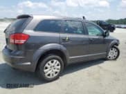 ✅ 2015 Dodge Journey American Value • VIN: 3C4PDCAB3FT596088 • Lot: 63964195. Wystawiony na Copart z przebiegiem 213 637 mil. Bezpłatny archiwum sprzedaży aukcyjnych z USA i szczegółowy raport historii pojazdu na DreamBid. Zdjęcie 3.