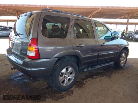 ✅ 2003 Mazda Tribute LX • VIN: 4F2YZ04173KM30578 • Lot: 42587190. Listed on IAAI with 158,185 mi. Free auction sales archive from the USA and detailed vehicle history report at DreamBid. Image 4.