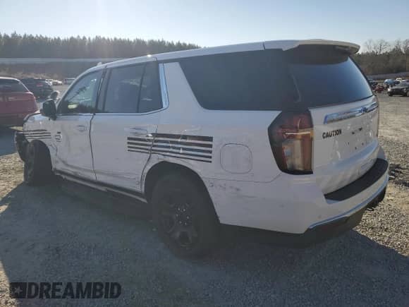 2023 Chevrolet Tahoe Commercial z VIN 1GNSKLED5PR183036, wystawiony jako Copart lot #88043635 z przebiegiem 9 421 mil mil oraz Szkoda całkowita • Salvage title. Historia ofert i sprzedaży dostępna na DreamBid. Obrazek 2.