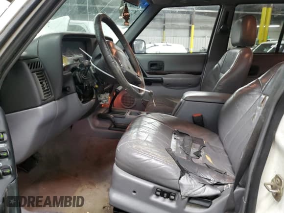 ✅ 1997 Jeep Cherokee Country • VIN: 1J4FJ78S0VL587323 • Lot: 89295355. Listed on Copart with 205,432 mi. Free auction sales archive from the USA and detailed vehicle history report at DreamBid. Image 7.