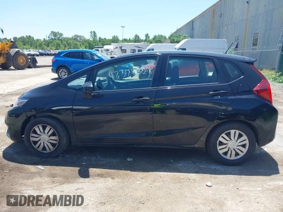 ✅ 2015 Honda Fit LX • VIN: 3HGGK5H56FM712266 • Lot: 42378228. Listed on IAAI with 140,423 mi. Free auction sales archive from the USA and detailed vehicle history report at DreamBid. Image 14.