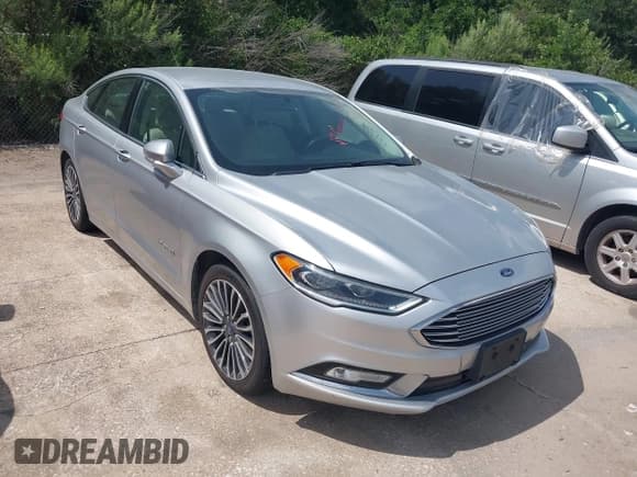✅ 2017 Ford Fusion Hybrid Titanium • VIN: 3FA6P0RU1HR317556 • Lot: 42549706. Listed on IAAI with 77,744 mi. Free auction sales archive from the USA and detailed vehicle history report at DreamBid. Image 1.