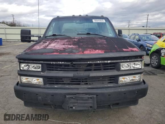1997 Chevrolet Silverado 3500 with VIN 1GCHC33J3VF052789, listed as a Copart auction lot 86842835 with 137,985 mi miles and Salvage title. Bid and sale history available at DreamBid. Image 5.
