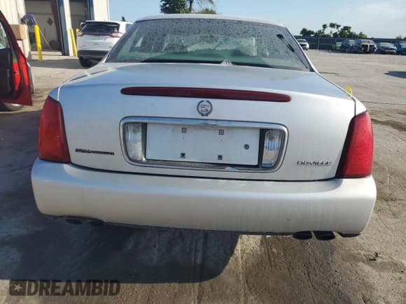 ✅ 2001 Cadillac DeVille • VIN: 1G6KD54Y11U205382 • Lot: 68302975. Wystawiony na Copart z przebiegiem 234 687 mil. Bezpłatny archiwum sprzedaży aukcyjnych z USA i szczegółowy raport historii pojazdu na DreamBid. Zdjęcie 6.