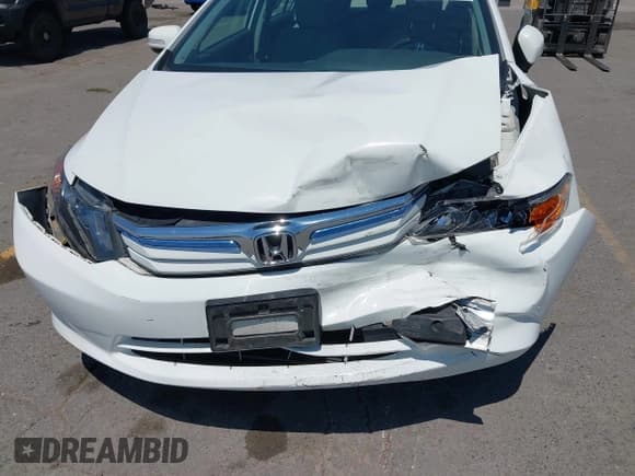 ✅ 2012 Honda Civic • VIN: JHMFB4F22CS000948 • Lot: 42661066. Wystawiony na IAAI z przebiegiem 70 709 mil. Bezpłatny archiwum sprzedaży aukcyjnych z USA i szczegółowy raport historii pojazdu na DreamBid. Zdjęcie 6.