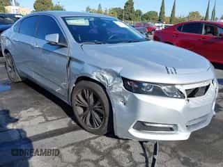 2015 Chevrolet Impala LT z VIN 1G1125S36FU118079, wystawiony jako IAAI lot #43144560 z przebiegiem 147 561 mil mil oraz . Historia ofert i sprzedaży dostępna na DreamBid. Obrazek 1.