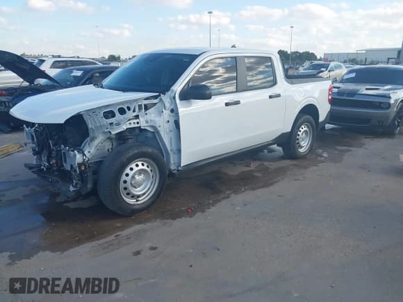 ✅ 2022 Ford Maverick XL • VIN: 3FTTW8E99NRA98857 • Лот: 43643288. Опубликован ранее на IAAI с пробегом 29 252 миль. Бесплатный доступ к архиву аукционных продаж из США и подробный отчёт об истории автомобиля на DreamBid. Изображение 2.