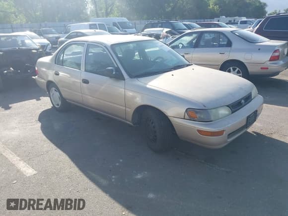 ✅ 1996 Toyota Corolla • VIN: 1NXBA02EXTZ465988 • Лот: 42486621. Опубликован ранее на IAAI с пробегом 251 775 миль. Бесплатный доступ к архиву аукционных продаж из США и подробный отчёт об истории автомобиля на DreamBid. Изображение 1.