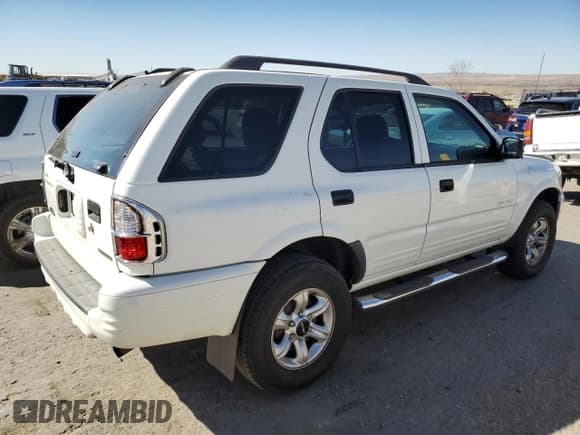 ✅ 2004 Isuzu Rodeo S • VIN: 4S2CK58YX44307841 • Lot: 46545285. Listed on Copart with 94,849 mi. Free auction sales archive from the USA and detailed vehicle history report at DreamBid. Image 3.