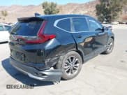 ✅ 2021 Honda CR-V EX-L • VIN: 2HKRW1H83MH419684 • Lot: 43520177. Listed on IAAI with 77,539 mi. Free auction sales archive from the USA and detailed vehicle history report at DreamBid. Image 4.