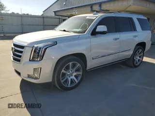 ✅ 2015 Cadillac Escalade Premium • VIN: 1GYS3NKJ3FR573301 • Lot: 71996555. Listed on Copart with 124,731 mi. Free auction sales archive from the USA and detailed vehicle history report at DreamBid. Image 1.