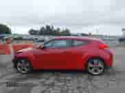 2016 Hyundai Veloster z VIN KMHTC6AD1GU288800, wystawiony jako IAAI lot #43305823 z przebiegiem 177 392 mil mil oraz . Historia ofert i sprzedaży dostępna na DreamBid. Obrazek 14.