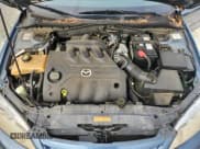 ✅ 2005 Mazda 6 Sport S • VIN: 1YVHP82DX55M00293 • Lot: 91430235. Wystawiony na Copart z przebiegiem 125 775 mil. Bezpłatny archiwum sprzedaży aukcyjnych z USA i szczegółowy raport historii pojazdu na DreamBid. Zdjęcie 11.