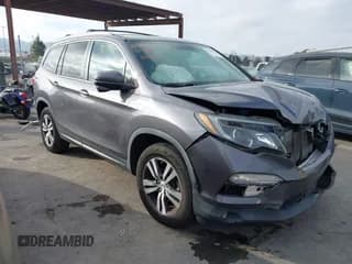 ✅ 2018 Honda Pilot EX-L • VIN: 5FNYF6H57JB014338 • Lot: 43791400. Listed on IAAI with 70,924 mi. Free auction sales archive from the USA and detailed vehicle history report at DreamBid. Image 1.