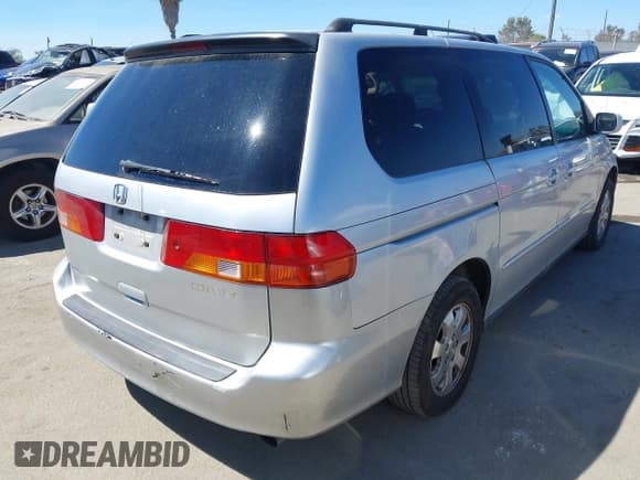 ✅ 2004 Honda Odyssey EX-RES • VIN: 5FNRL18884B110770 • Lot: 43160984. Listed on IAAI with 207,778 mi. Free auction sales archive from the USA and detailed vehicle history report at DreamBid. Image 4.