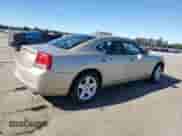 2009 Dodge Charger Police z VIN 2B3KA43T79H572065, wystawiony jako Copart lot #67554764 z przebiegiem 119 259 mil mil oraz Czysty tytuł • Clean title. Historia ofert i sprzedaży dostępna na DreamBid. Obrazek 3.