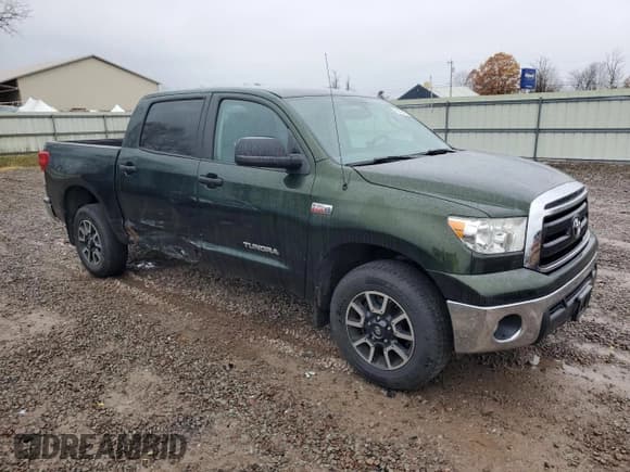 ✅ 2012 Toyota Tundra • VIN: 5TFDY5F18CX260231 • Lot: 90930675. Listed on Copart with 193,914 mi. Free auction sales archive from the USA and detailed vehicle history report at DreamBid. Image 4.