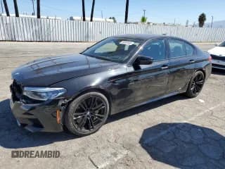 ✅ 2018 BMW M5 • VIN: WBSJF0C5XJB283726 • Lot: 66004983. Wystawiony na Copart z przebiegiem 64 946 mil. Bezpłatny archiwum sprzedaży aukcyjnych z USA i szczegółowy raport historii pojazdu na DreamBid. Zdjęcie 1.