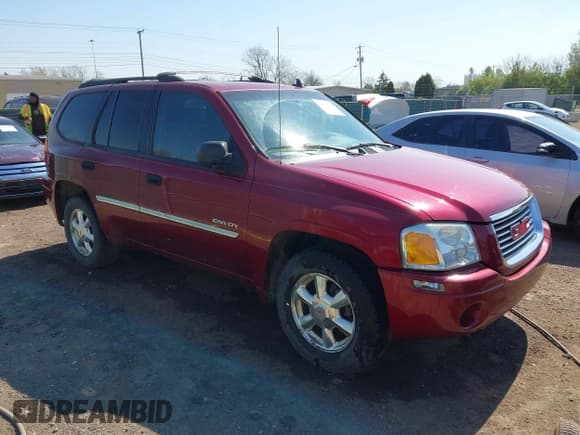✅ 2006 GMC Envoy SLT • VIN: 1GKDT13S662189377 • Lot: 42106602. Listed on IAAI with 156,391 mi. Free auction sales archive from the USA and detailed vehicle history report at DreamBid. Image 1.