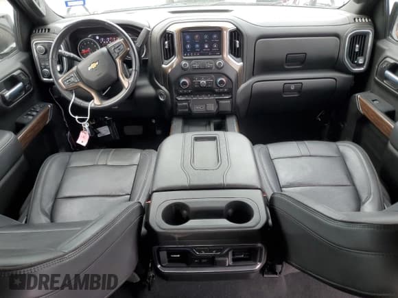 ✅ 2021 Chevrolet Silverado 1500 High Country • VIN: 3GCPWFED5MG429373 • Lot: 69482934. Wystawiony na Copart z przebiegiem 58 880 mil. Bezpłatny archiwum sprzedaży aukcyjnych z USA i szczegółowy raport historii pojazdu na DreamBid. Zdjęcie 8.