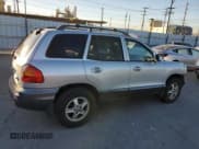 ✅ 2001 Hyundai Santa Fe GLS • VIN: KM8SC83D81U116159 • Лот: 87457485. Опубликован ранее на Copart с пробегом 130 440 миль. Бесплатный доступ к архиву аукционных продаж из США и подробный отчёт об истории автомобиля на DreamBid. Изображение 3.