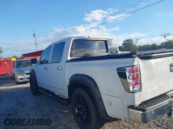 ✅ 2015 Nissan Titan SL • VIN: 1N6BA0ED0FN506101 • Лот: 43317144. Опубликован ранее на IAAI с пробегом 245 822 миль. Бесплатный доступ к архиву аукционных продаж из США и подробный отчёт об истории автомобиля на DreamBid. Изображение 14.