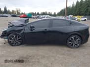 ✅ 2026 Toyota Prius XSE • VIN: JTDACACU1T3058833 • Lot: 43512928. Listed on IAAI with 1,885 mi. Free auction sales archive from the USA and detailed vehicle history report at DreamBid. Image 14.