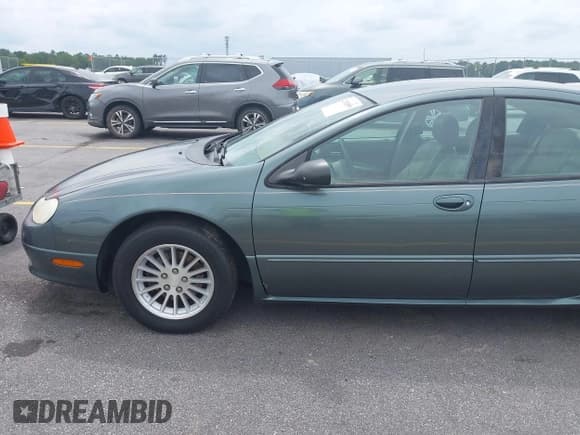 ✅ 2004 Chrysler Concorde LXi • VIN: 2C3HD36M64H633854 • Lot: 42392859. Listed on IAAI with 129,010 mi. Free auction sales archive from the USA and detailed vehicle history report at DreamBid. Image 16.