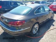 ✅ 2013 Volkswagen CC Executive • VIN: WVWGU7AN0DE555948 • Лот: 43101933. Опубликован ранее на IAAI с пробегом 184 060 миль. Бесплатный доступ к архиву аукционных продаж из США и подробный отчёт об истории автомобиля на DreamBid. Изображение 4.