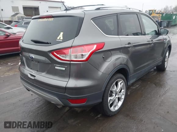 ✅ 2013 Ford Escape Titanium • VIN: 1FMCU0J91DUD49225 • Lot: 43880358. Listed on IAAI with 143,377 mi. Free auction sales archive from the USA and detailed vehicle history report at DreamBid. Image 4.