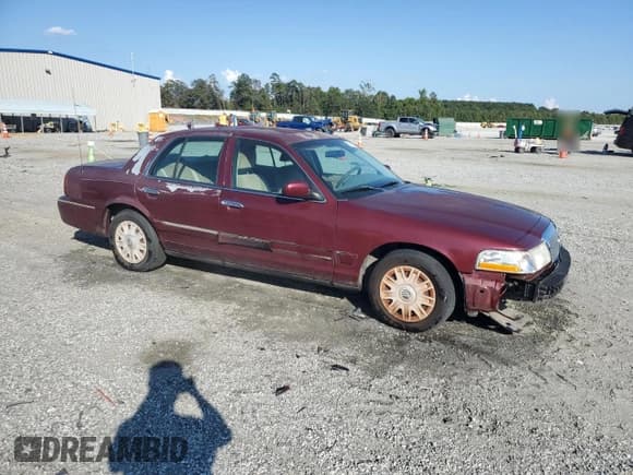 ✅ 2005 Mercury Grand Marquis GS • VIN: 2MEFM74W75X652692 • Lot: 81661215. Wystawiony na Copart z przebiegiem 126 934 mil. Bezpłatny archiwum sprzedaży aukcyjnych z USA i szczegółowy raport historii pojazdu na DreamBid. Zdjęcie 4.
