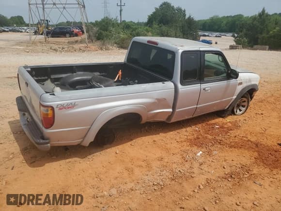 ✅ 2003 Mazda B-Series DS • VIN: 4F4YR16V03TM05710 • Лот: 54114605. Опубликован ранее на Copart с пробегом 187 857 миль. Бесплатный доступ к архиву аукционных продаж из США и подробный отчёт об истории автомобиля на DreamBid. Изображение 3.