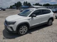 ✅ 2023 Volkswagen Taos S • VIN: 3VVFX7B24PM313154 • Lot: 59332015. Listed on Copart with 24,935 mi. Free auction sales archive from the USA and detailed vehicle history report at DreamBid. Image 1.