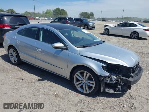 ✅ 2014 Volkswagen CC Executive • VIN: WVWRP7AN9EE504627 • Lot: 42044187. Listed on IAAI with 114,153 mi. Free auction sales archive from the USA and detailed vehicle history report at DreamBid. Image 1.