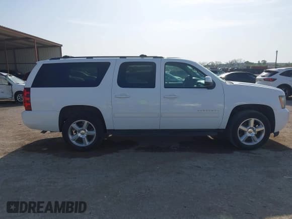 ✅ 2011 Chevrolet Suburban LT • VIN: 1GNSCJE02BR160367 • Lot: 42023236. Listed on IAAI with 158,689 mi. Free auction sales archive from the USA and detailed vehicle history report at DreamBid. Image 13.