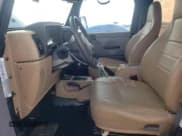 ✅ 2002 Jeep Wrangler SE • VIN: 1J4FA29P52P745401 • Lot: 61826095. Wystawiony na Copart z przebiegiem 133 486 mil. Bezpłatny archiwum sprzedaży aukcyjnych z USA i szczegółowy raport historii pojazdu na DreamBid. Zdjęcie 7.