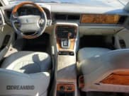 ✅ 1996 Jaguar XJ Vanden Plas • VIN: SAJKX6240TC780318 • Лот: 64213625. Опубликован ранее на Copart с пробегом 163 020 миль. Бесплатный доступ к архиву аукционных продаж из США и подробный отчёт об истории автомобиля на DreamBid. Изображение 8.