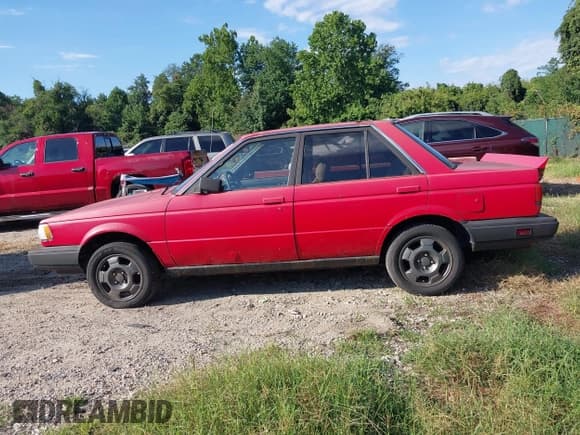 ✅ 1989 Nissan Sentra • VIN: 1N4GB21S0KC786989 • Лот: 43059256. Опубликован ранее на IAAI с пробегом 82 439 миль. Бесплатный доступ к архиву аукционных продаж из США и подробный отчёт об истории автомобиля на DreamBid. Изображение 14.