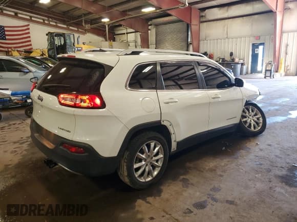 ✅ 2016 Jeep Cherokee Limited • VIN: 1C4PJLDB0GW216303 • Lot: 82265635. Listed on Copart with 131,659 mi. Free auction sales archive from the USA and detailed vehicle history report at DreamBid. Image 3.